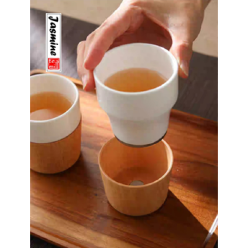 white porcelain tea set with bamboo handle