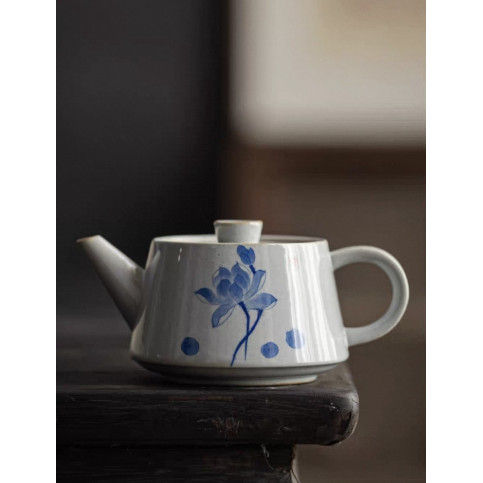 Porcelain teapot with lotus