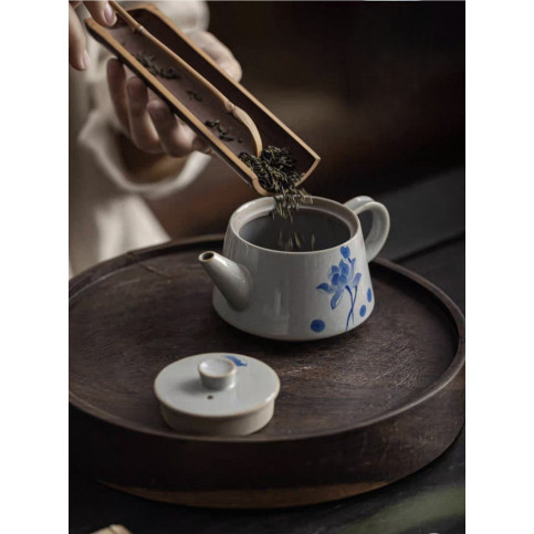 Porcelain teapot with lotus