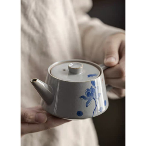 Porcelain teapot with lotus